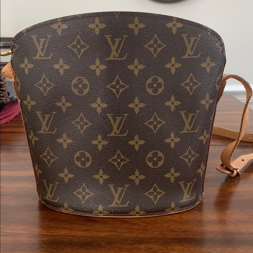 LV Drouot Crossbody.Strap has been repaired may eventually need to be replaced.